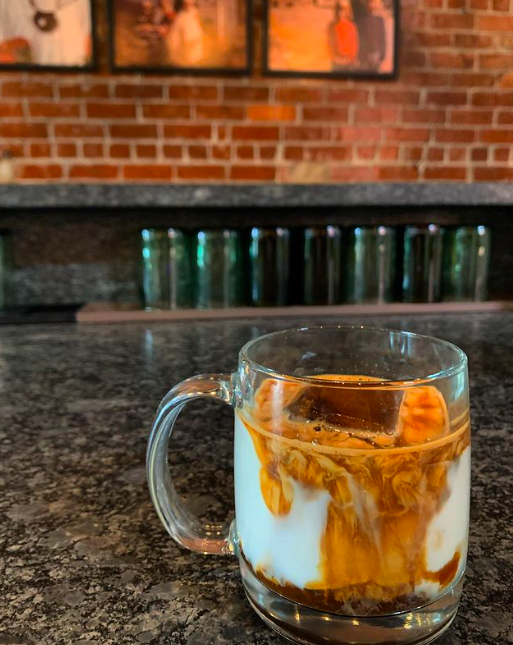 Coffee in a glass mug at Garmony House